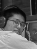 Hitoshi's picture in front of generated Kolja's face
